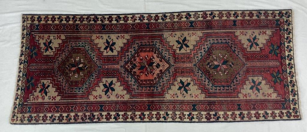 Hand Knotted Persian Serab Rug: Hand-knotted Persian style rug featuring bold tribal geometric designs and star-like motifs typical of rugs woven in the Serab region of northwestern Iran. Serab rugs are known for their strong