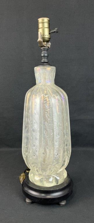 Italian Art Glass Lamp: Elegant Murano art glass vase-form lamp with an iridescent surface and ribbed form, mounted on a wood base. Measures approximately 20" H x 5 1/2" in diameter. Good condition with some wear to the
