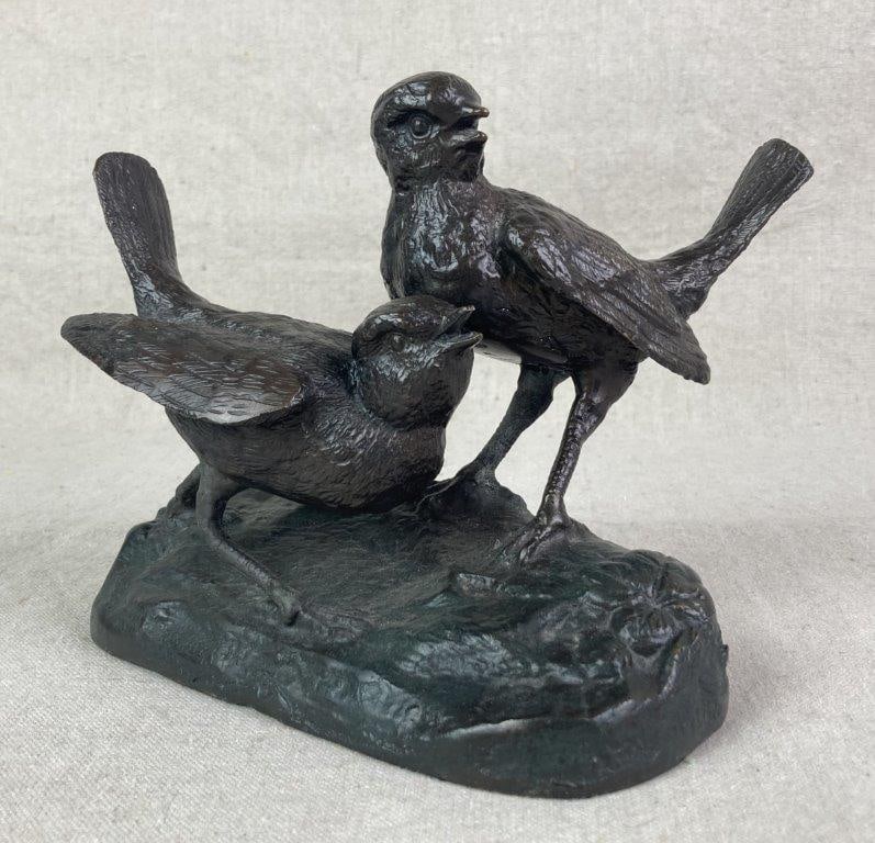 Vintage Bronze Bird Sculpture: Cast bronze sculpture depicting two birds perched on a rock-form base with a leaf accent. Finely detailed feathers and naturalistic modeling throughout. Measures approximately 6 1/4" H x 7 1/2" W x 5