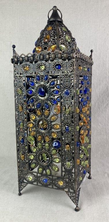 Jeweled Moroccan Brass Table Lamp: Brass table lamp with a sturdy metal frame featuring an intricate, ornate Moroccan pattern, accented with green, yellow, and blue jeweled details. Measures approximately 24" H x 8" W x 7 3/4" D. Good