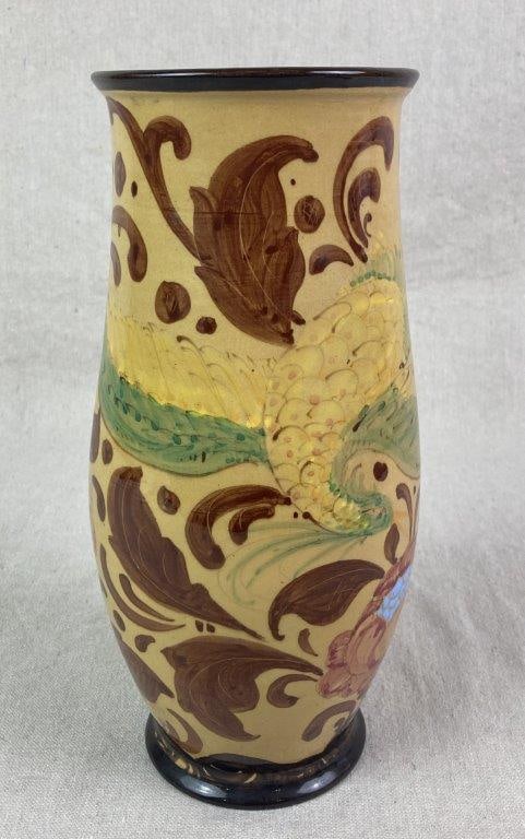 Italian Roma Painted Vase: An Art Nouveau style faience vase decorated with flowing floral and avian motifs set against a yellow ground, featuring a flared rim and tapered body. The underside has a hole and is signed
