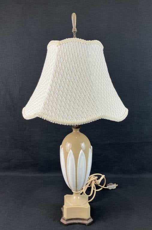 Mid Century Glazed Pottery Table Lamp: Form with neoclassical inspiration, finished in a soft taupe glaze with graceful proportions and white applied decoration. Measures approximately 25" H x 11 1/2" diameter including the shade. Tested