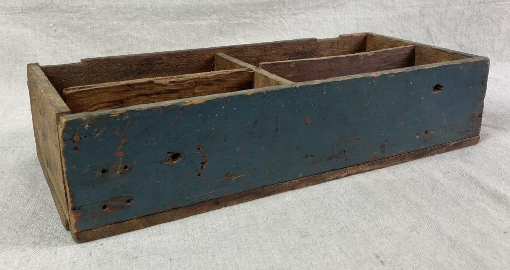 Wood Tool Caddy: A blue painted primitive wood tool caddy featuring a four-compartment configuration. The hand-constructed form exhibits a naturally worn aged patina, showcasing its utilitarian history. Measures