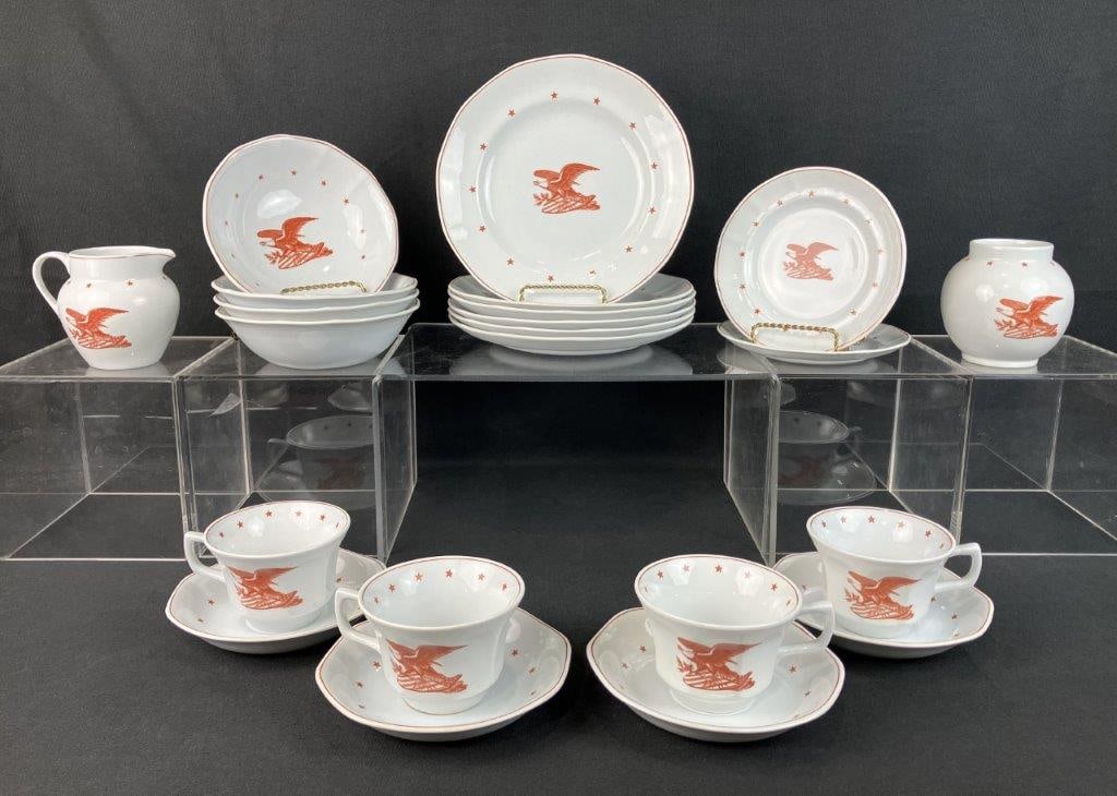 Wedgwood American Eagle Dinner Service: Assembled service including six salad plates, four saucers, two small plates, four teacups, a creamer, and an open sugar bowl. Each piece is decorated with the Great Seal of the United States,