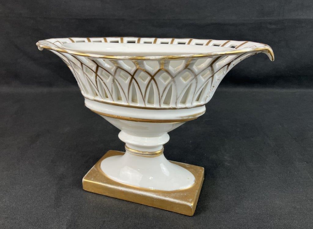 Old Paris Gilt Porcelain Flower Compote: Old Paris porcelain flower compote or basket featuring an elegant reticulated design with gilt decoration throughout. The French porcelain form is delicately pierced, creating an airy openwork