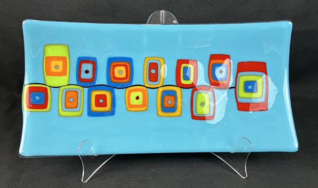 Modern Fused Glass Art Tray: Signed by the artist. Modern design featuring geometric forms in vibrant tones on a fused glass surface. Measures approximately 1 5/8â€³ H x 15 1/8â€³ W x 7