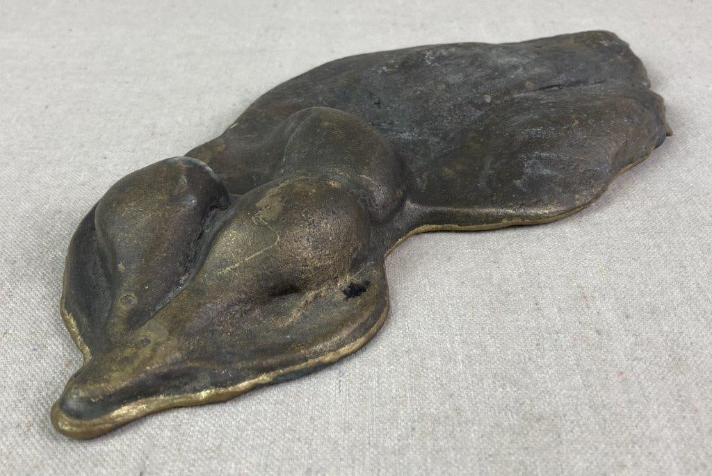 Abstract Relief Sculpture by Theo Sable: A bronze relief sculpture comprised of a fragmentary bronze form with raised abstract details, executed by Theo Sable. Theodora â€œTheoâ€ Sable was a New York artist