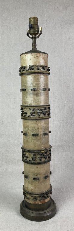 Antique Printing Roller Lamp: fabric or wallpaper printing roller upcycled into a lamp, wood cylinder with wood hand-carved raised patterns, floral motif remnants, worn aged patina, Measures approximately 27 1/4'' H x 5 1/2'' W x