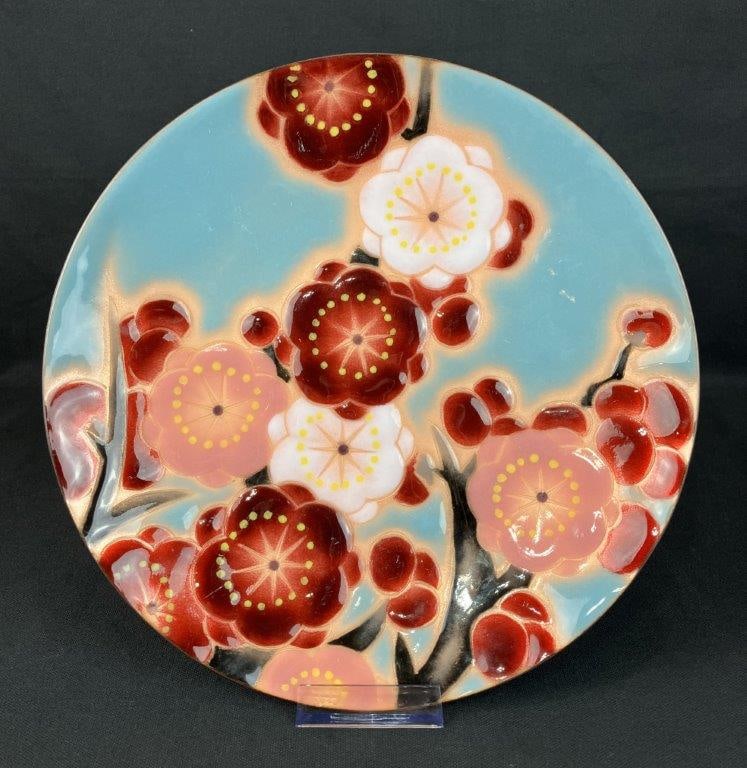 Ando Cloisonne Cherry Blossom Plate: Decorated with Japanese cherry blossoms in a modern, vibrantly colored style. Label to the reverse. Measures approximately 1â€³ H x 10 7/8â€³ diameter. Good condition.