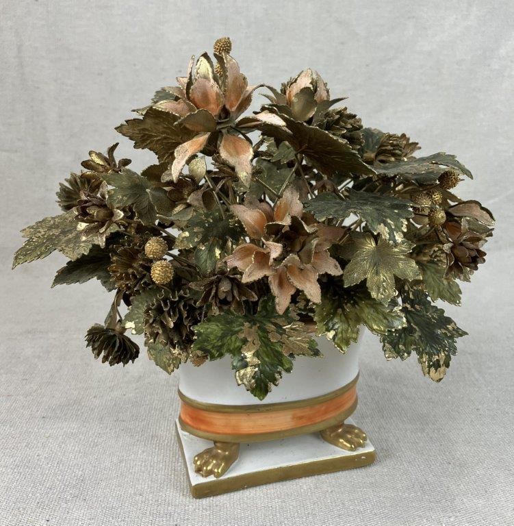 Jane Hutchinson Handmade Floral Arrangement: Metal floral arrangement with polychromed and gilt finish mounted in a porcelain base, attributed to Jane Hutchinson. The base is formed as a charming porcelain clawfoot tub. Measures approximately