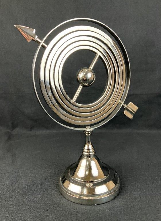 Armillary Sphere: Silvertone metal armillary sphere with classic celestial design, suitable for tabletop decor. Measures approximately 14â€³ H x 10â€³ W x 5â€³ D. Good