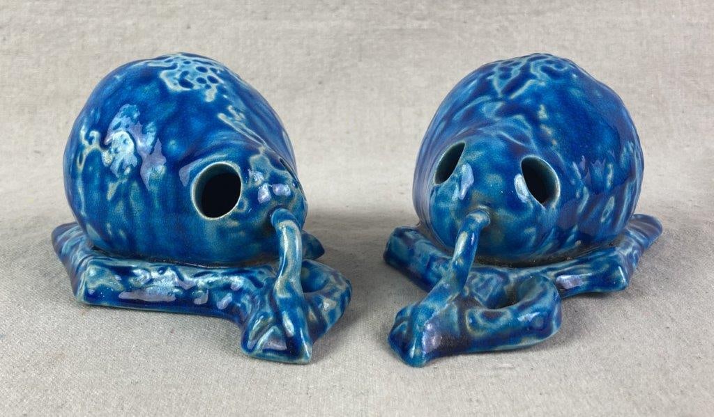 Pair of French Majolica Wall Pocket Vase: Cobalt blue glazed wall pocket vases in the form of pears with a leaf motif, rendered in the French Majolica style. Each measures approximately 3 1/2â€³ H x 3 3/4â€³ W