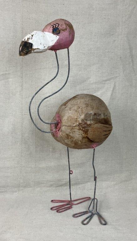 Flamingo Folk Art Sculpture: Whimsical sculpture composed of a central coconut and wood body with a polychromed wood face and metal support structure. Charming folk art character. Measures approximately 21 1/4â€³