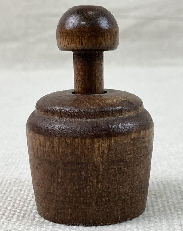 Butter Mold: Wooden butter mold featuring a pineapple design with a rich dark patina. Measures approximately 2 3/4â€³ H x 1 1/4â€³ diameter. Good condition. 