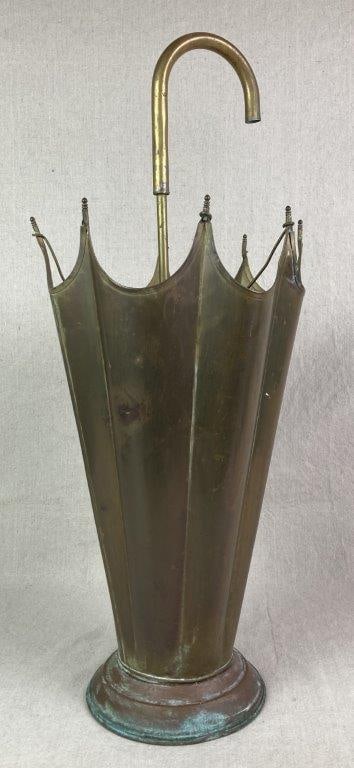 Mid-Century Modern Brass Umbrella Motif Stand: A brass umbrella stand formed in the shape of an umbrella with a copper base, exhibiting a worn aged patina. Measures approximately 25 1/2'' H x 10 1/2'' W x 10 1/2'' D, Age-appropriate wear, some oxi