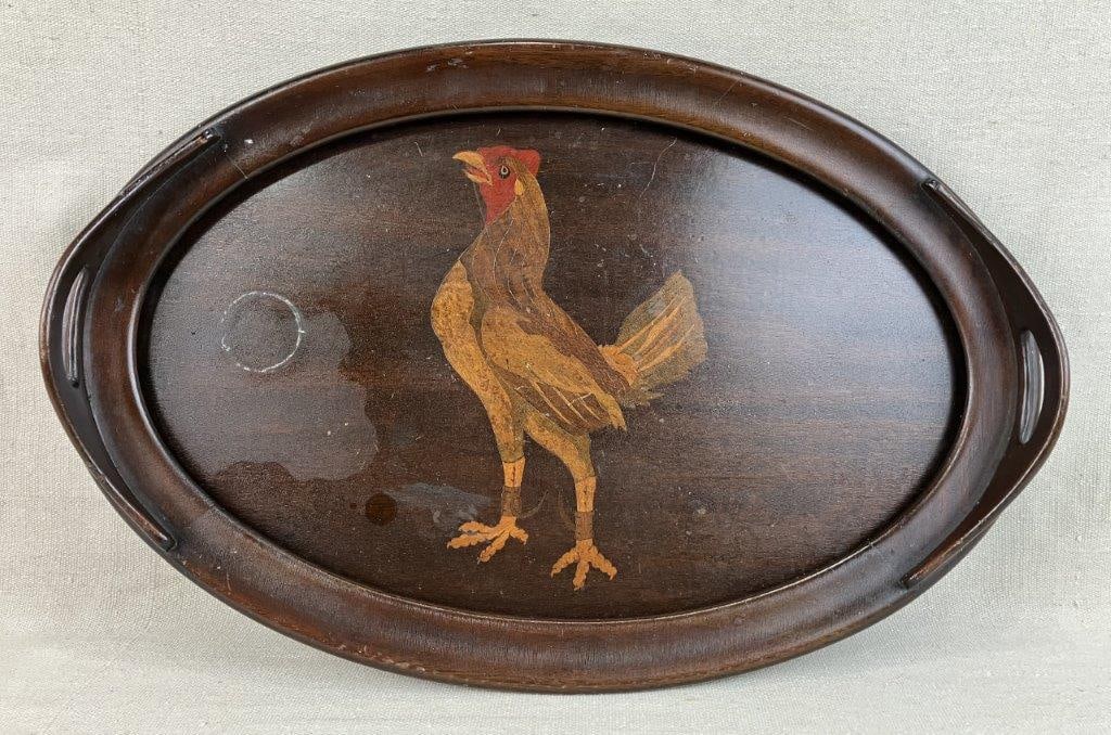 Rooster Mahogany Marquetry Serving Tray: Elegant oval serving tray crafted in mahogany with a rich deep red finish. The center features a decorative marquetry inlay depicting a crowing rooster in an alert and lively pose, creating a