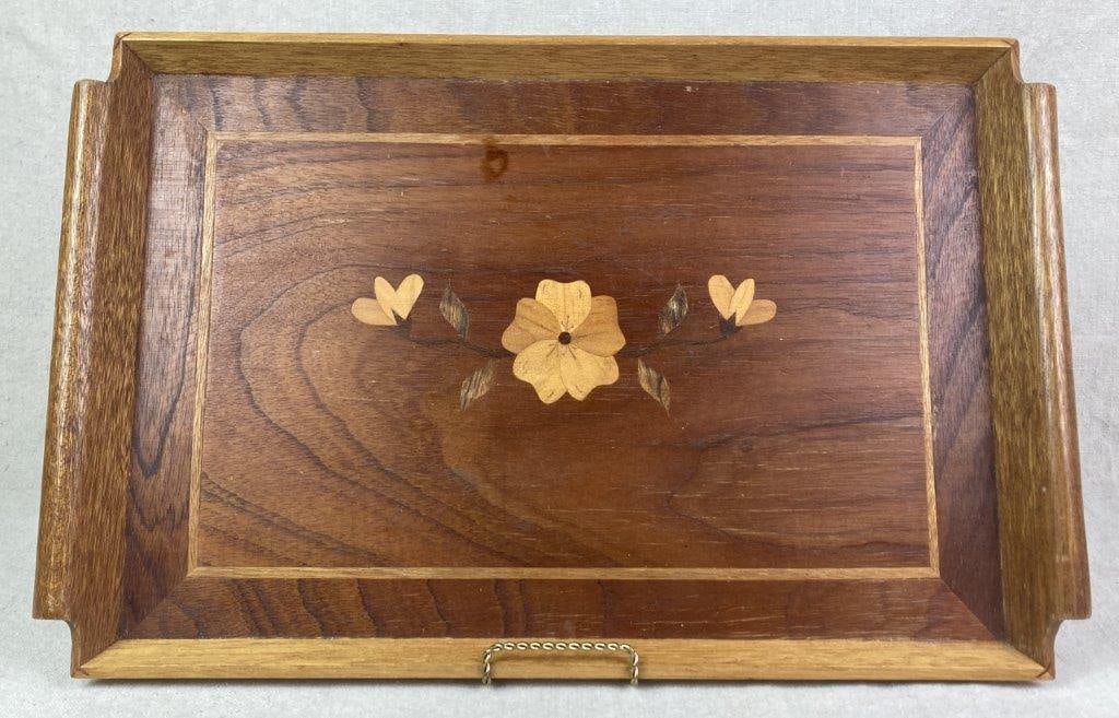 Mid-Century Modern Marquetry Serving Tray: A wood serving tray featuring a floral marquetry inlay design, fitted with handles on each side and composed of a warm selection of woods. The surface retains a warm patina consistent with age and