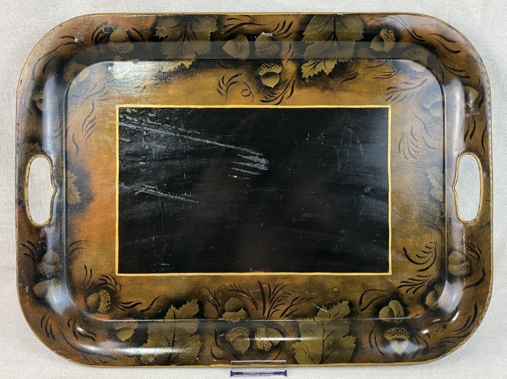 Wilton RWP Pewter Serving Platter: Tole tray with black ground and warm gold-toned decoration depicting acorns and maple leaves in a folk art tradition. Measures approximately 1 1/8â€³ H x 19 5/8â€³ W x