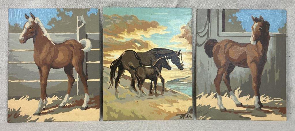 Three Folk Art Horse Paintings: Group of three horse depictions executed in the paint-by-number technique on board. Smooth brushwork and careful paint application reflect the characteristic style of the medium. One example is