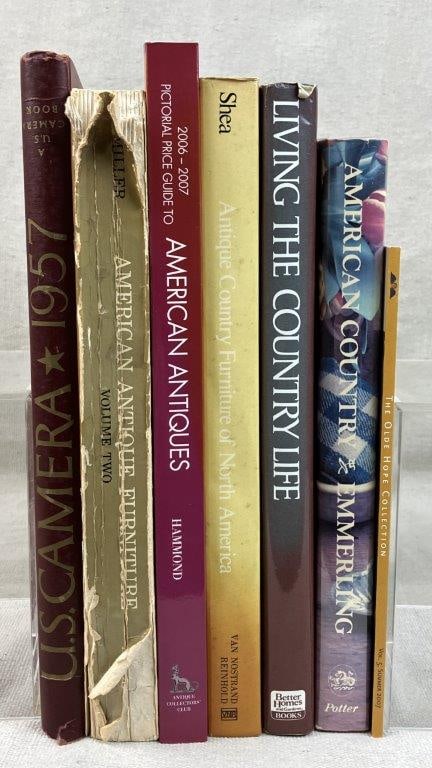 Seven Books Including Country and Antique Collecting Themes: A comprehensive grouping of reference volumes and lifestyle books focusing on early American material culture and rustic aesthetics. Notable titles include Antique Country Furniture of North America,
