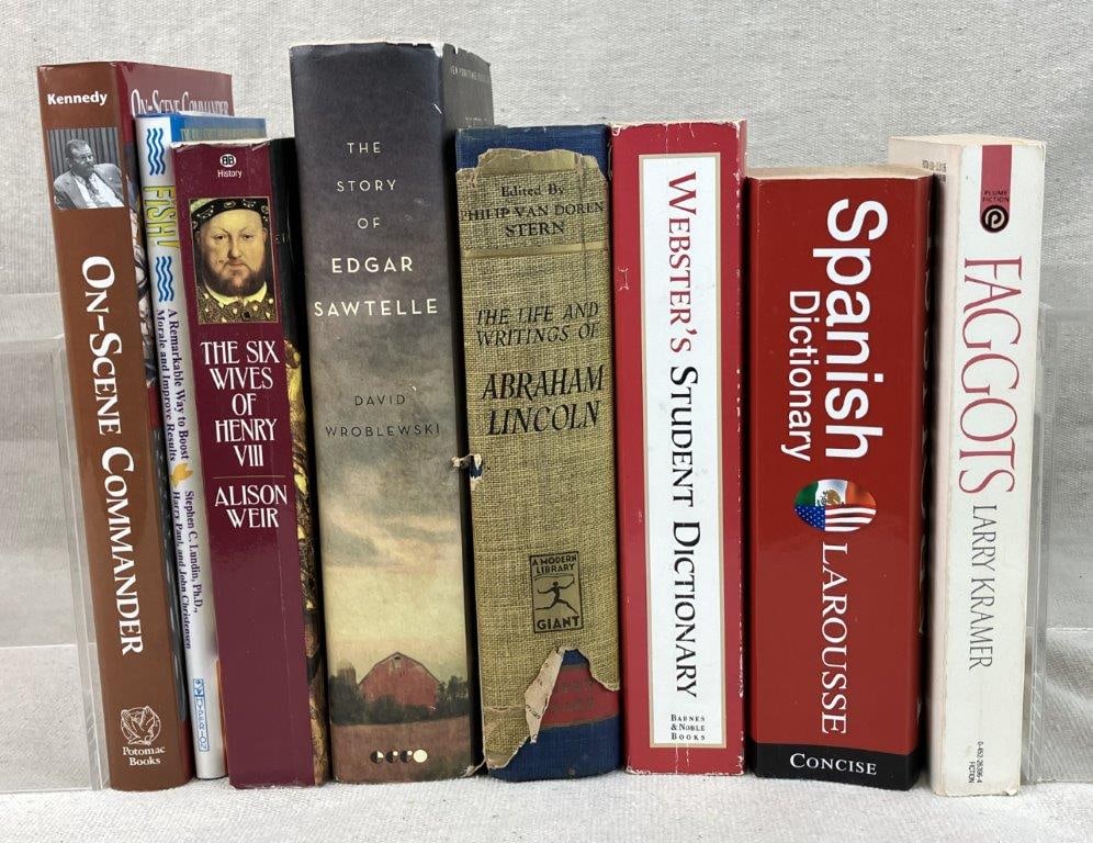 Assortment of Seven Dictionary and Historical Books: A diverse grouping of educational and biographical volumes. This group includes a Spanish and English Student Dictionary, a biographical volume on Abraham Lincoln, and the historical account On Scene
