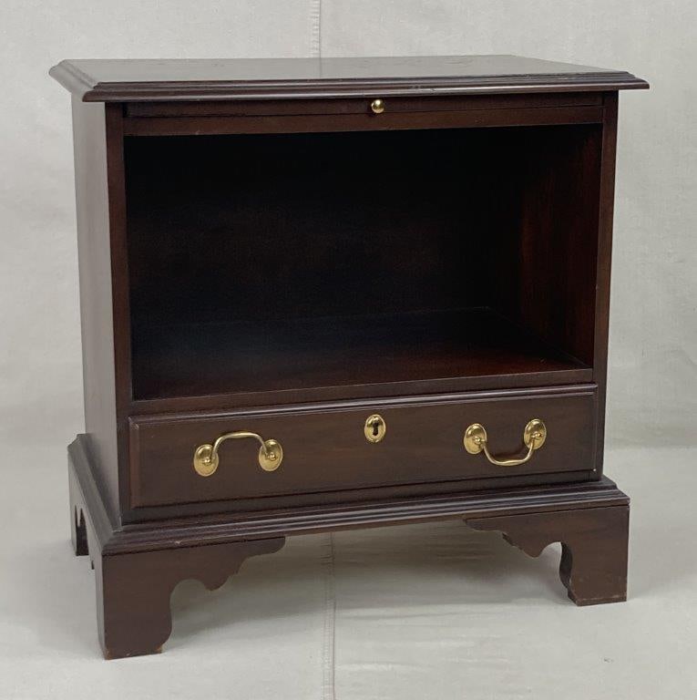 Harden One-Drawer Cherry Georgian Style Nightstand: A high-quality bedside chest by Harden crafted in the refined Georgian taste. This piece features a rich dark cherry finish and is designed with a functional pull-out slide above a single deep