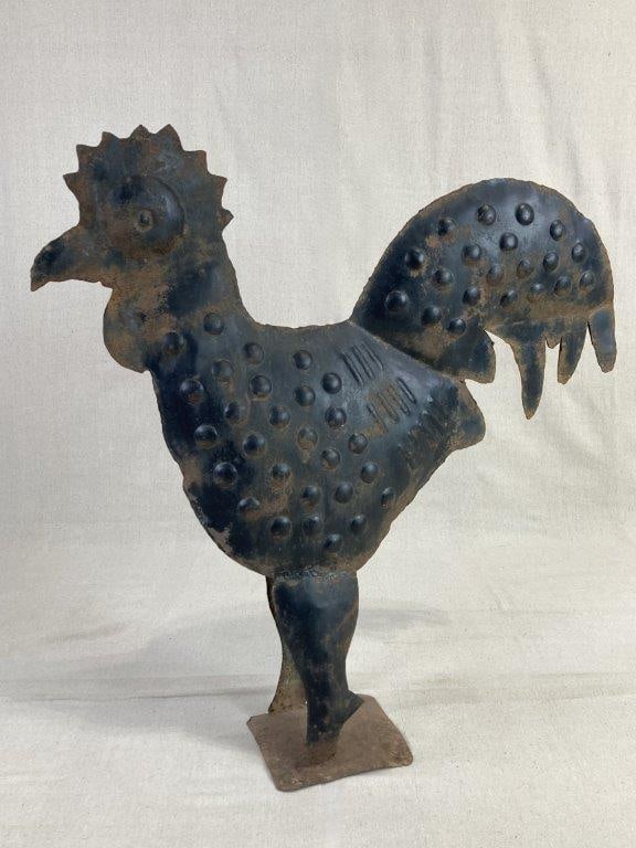 Iron Rooster Sculpture: A sculpture crafted from sheet iron in the stylized form of a rooster, featuring tactile raised dots across the body for added texture and visual interest. Set upon a square base, the sculpture