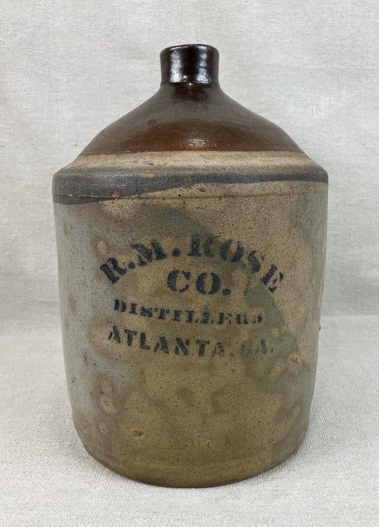 R.M. Rose Distillery Atlanta, GA Jug: Stacker jug features an applied handle and stamped "R.M. Rose Distillery" mark; measures approximately 12" H x 7" in diameter; good condition with minimal abrasions. 