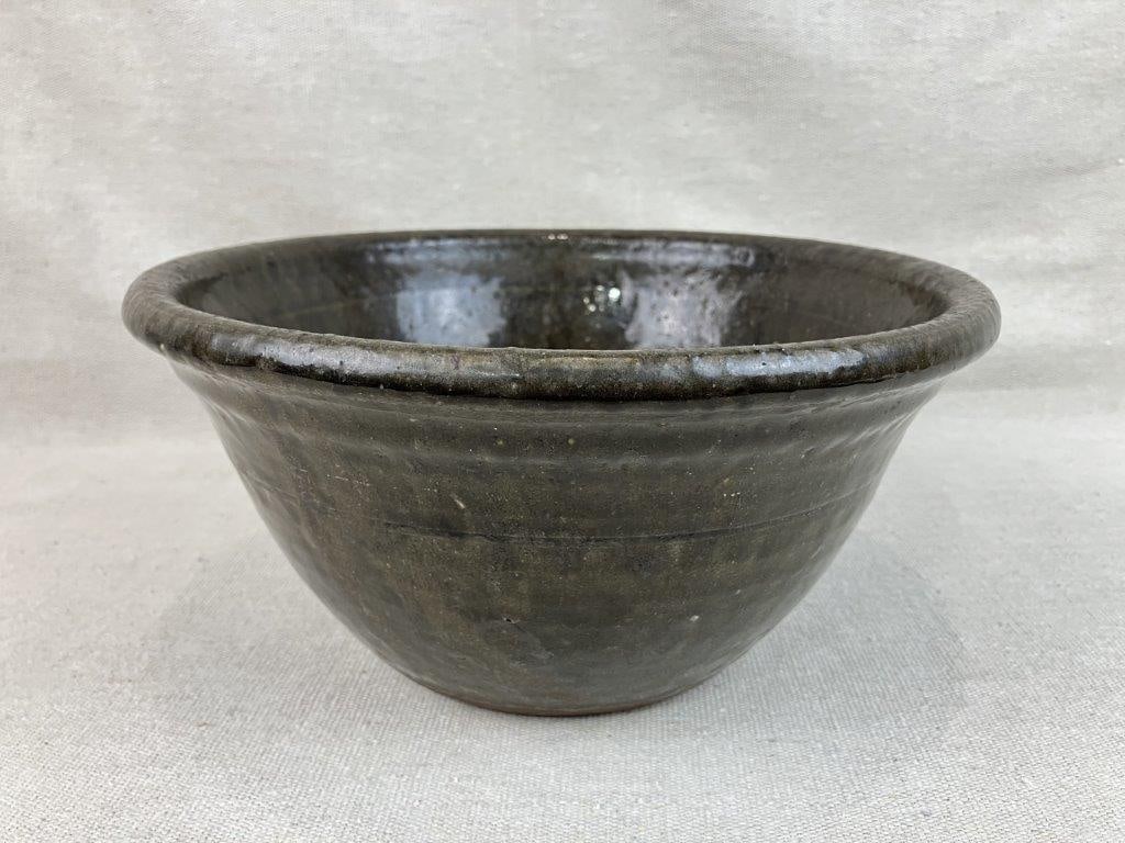 Lanier Meaders Alkaline Glaze Bowl: White County, GA, (October 4, 1917 – February 5, 1998) 20th Century; features a slightly flared form with a defined lip and a rich, runny alkaline glaze; incised signature to the base; the