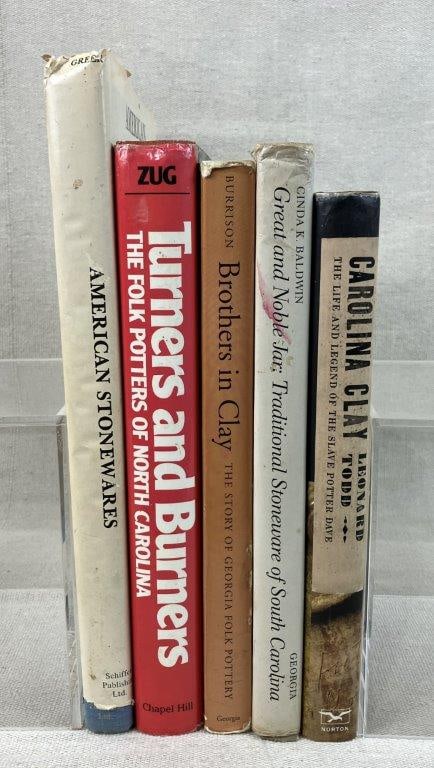 Assortment of Five Stoneware Reference Books: Group of five stoneware reference books including Turners and Burners: The Folk Potters of North Carolina, American Stonewares, Brothers in Clay: The Story of Georgia Folk Pottery, Carolina Clay: The