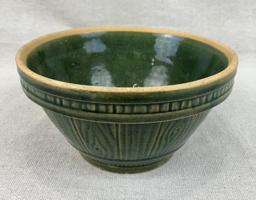 American Yellow Ware Pottery Bowl: This bowl features an embossed faux wood texture finished in a rich green glaze. It measures approximately 3 7/8" H x 7 1/4" in diameter. The bowl remains in overall good condition with some natural c