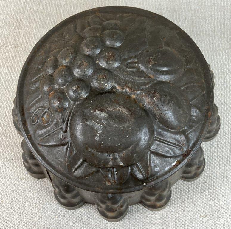 Four Tin and Copper Molds - 12