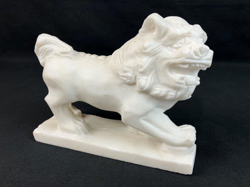 Foo Dog Figure: Carved stone foo dog figure featuring a traditional guardian form, with natural quartz inclusions that create a subtle sparkling effect throughout the stone. The piece displays solid carving with