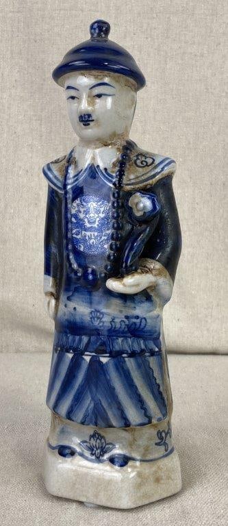 Chinese Painted Porcelain Figure: Hand-painted porcelain statue represents an emperor from the Qing Dynasty, depicted in traditional regal attire. The figure features intricate detailing, including a long ceremonial bead necklace and