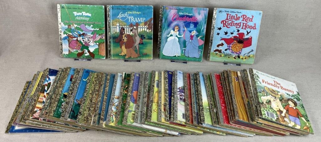 Fifty Childrens Golden Books: Group of vintage childrens books from the Little Golden Book Series including Disneys Lady and the Tramp, Tiny Toon Adventures,Disneys Cinderella, and more. One measures approximately 8" H x 6 3/4" W