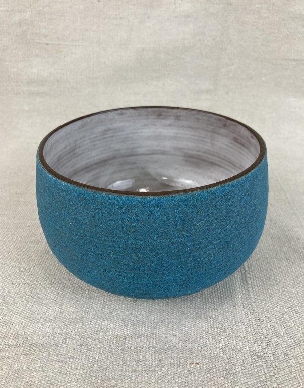 Vivika and Otto Art Pottery Bowl: Turned art pottery bowl featuring a textured matte turquoise exterior that provides a rich, tactile surface. The interior is finished with a contrasting brushed white glaze, showcasing the collaborati