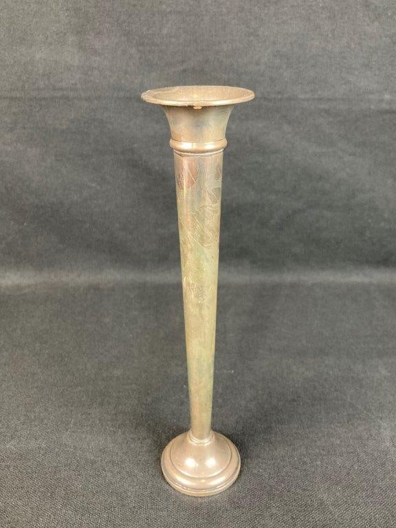 Reed And Barton Weighted Sterling Bud Vase: This elegant bud vase from the renowned American silversmith Reed & Barton features a classic trumpet form, flaring gracefully at the rim to showcase a single stem or a delicate arrangement. The weigh