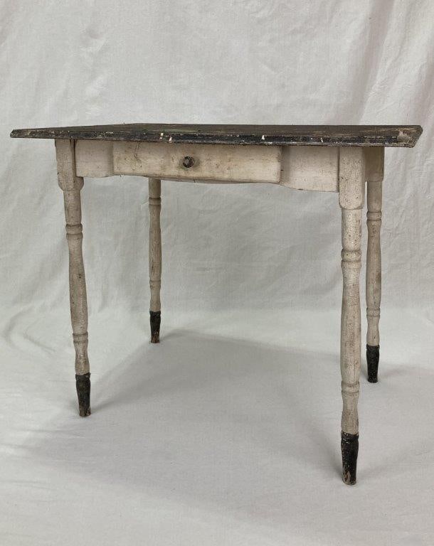 Country Painted One Drawer Stand: Country stand with a white painted surface, raised on turned legs, presenting a classic rural form with timeworn character. Measures approximately 30â€³ H x 33 3/8â€³