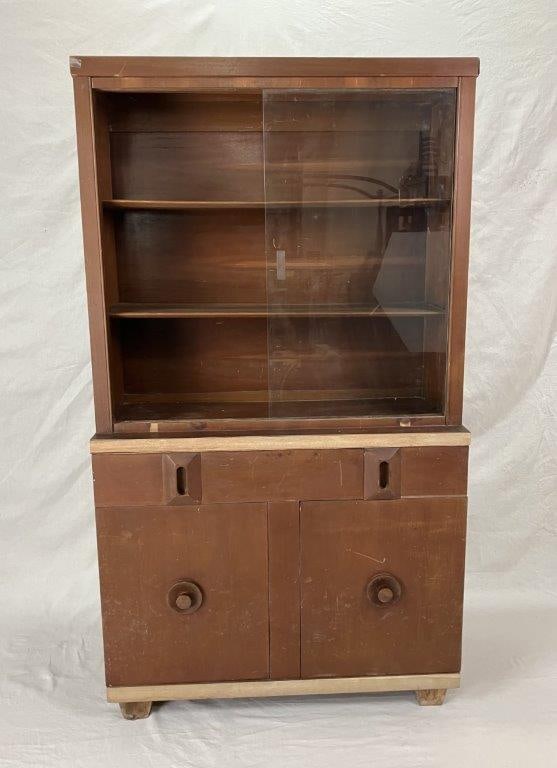 Mid Century Modern American China Cabinet: Mid century modern china cabinet by American of Martinsville, featuring glass-paneled upper display doors and enclosed storage to the base, with stylized pulls and clean-lined form. Measures