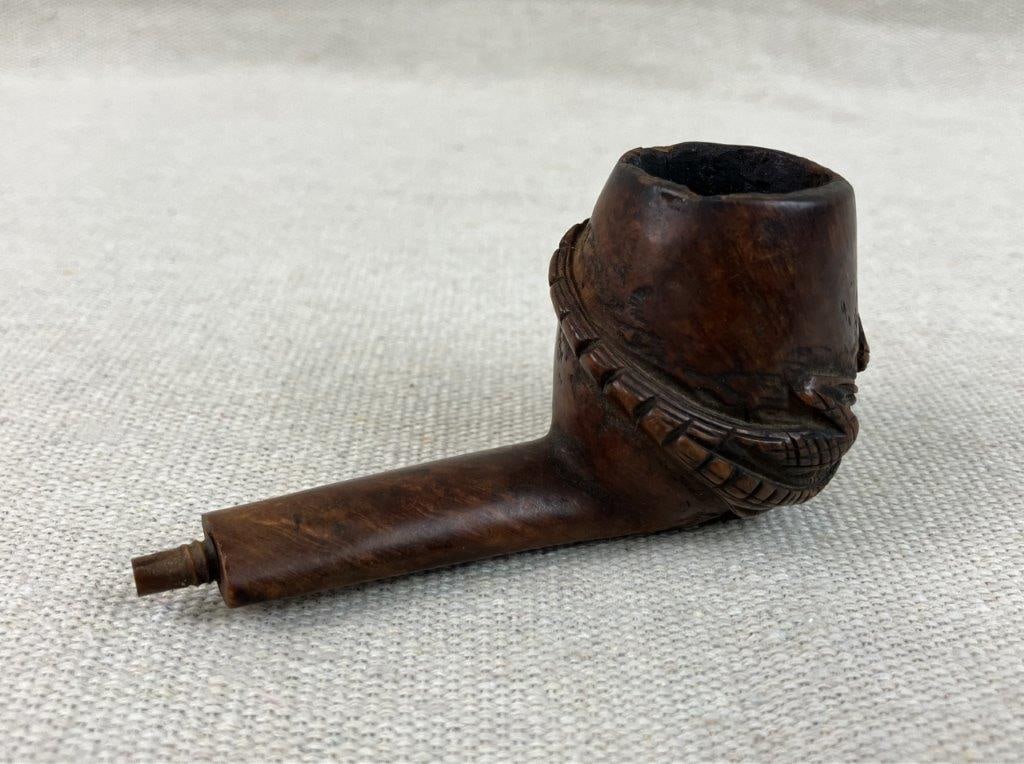 Folk Art Alligator Pipe: American folk art pipe featuring an alligator in relief encircling the bowl, displaying carved detail and rustic character. Mouthpiece not included. Measures approximately 1 3/4â€³ H