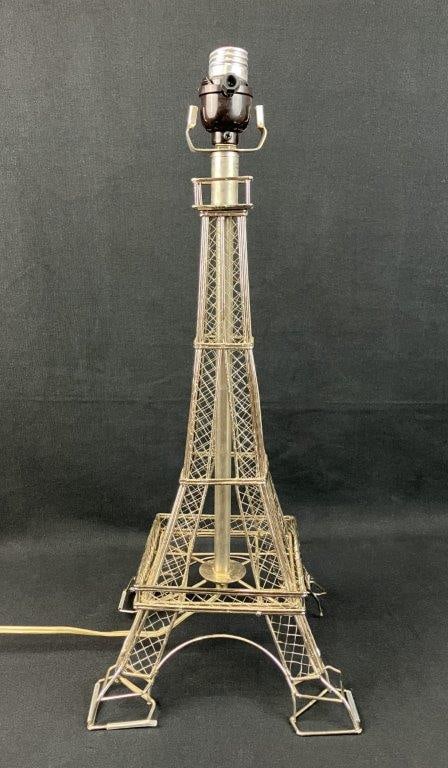 Eiffel Tower Form Lamp: Wirework lamp in the form of the Eiffel Tower, featuring an openwork construction and architectural silhouette. Measures approximately 19â€³ H x 7 1/4â€³ W x 7