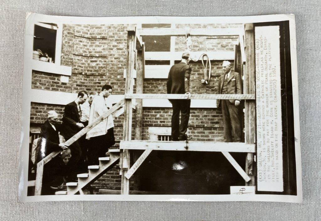 Roscoe â€œRedâ€ Jackson Execution Photograph, 1937: Photograph documenting the 1937 execution by hanging of Roscoe 'Red' Jackson, relating to the murder of Pearl Bozarth. The image presents a stark historical record of the event. The photograph