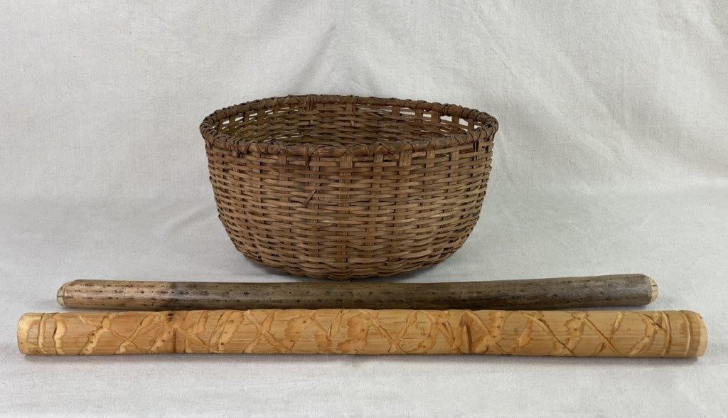Country Storage Basket with Rainsticks: This robust round-bodied split oak gathering basket is a fine example of traditional hand-woven utility, featuring a wide, open form perfect for storage or display. The basket possesses a warm patina
