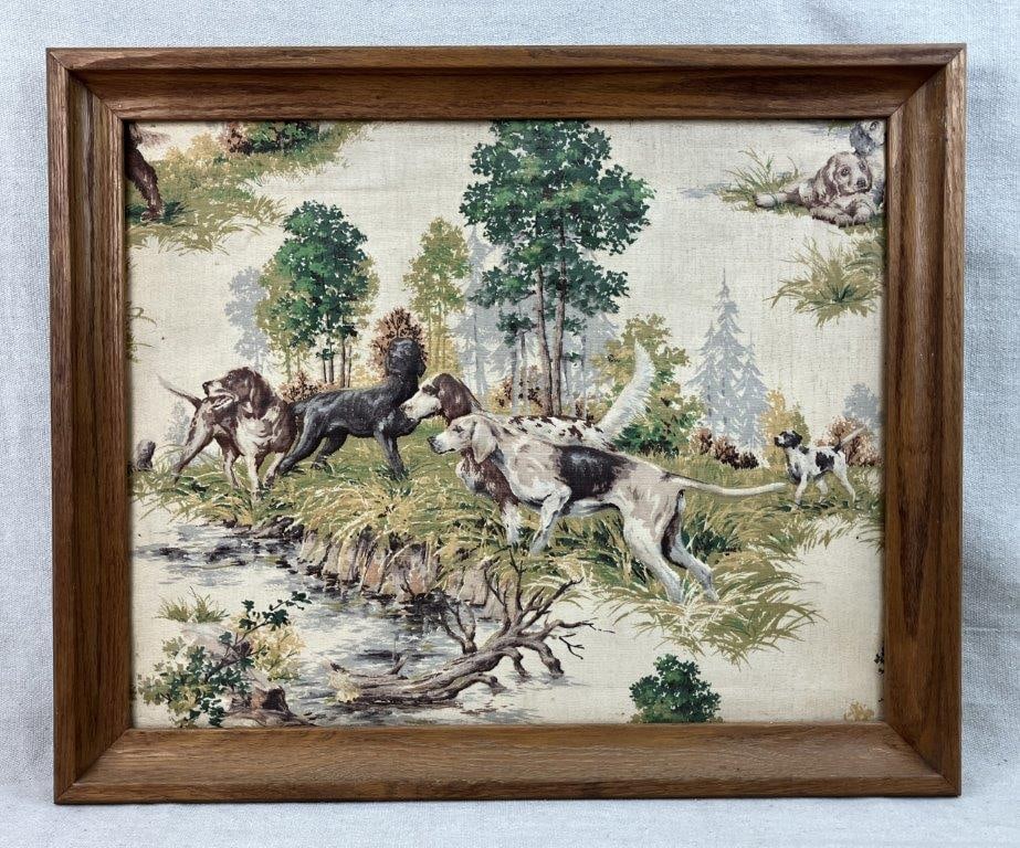 Bird Dog Framed Tapestry: Tapestry depicting a gathering of hunting dogs in a forest landscape, executed in stuffed and printed dimensional fabric, and housed in a wood frame. Frame measures approximately 18