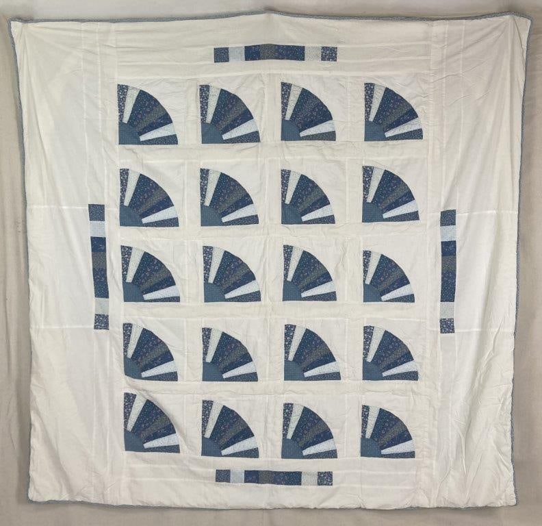 Grandmothers Fan Quilt by "Bettie" Elizabeth Elrod: Quilt in a blue color palette, composed in the traditional Grandmotherâ€™s Fan pattern with hand-stitched construction and a soft textile character. Measures approximately 85