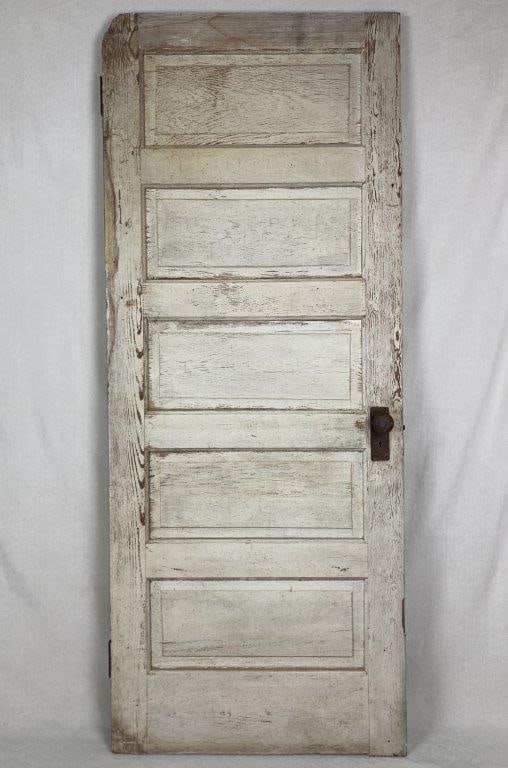 Antique Painted Door: Antique wooden door with a painted surface and areas of exposed wood showing a rich, timeworn patina, presenting a desirable rustic character. Measures approximately 79 1/2â€³ H x 32