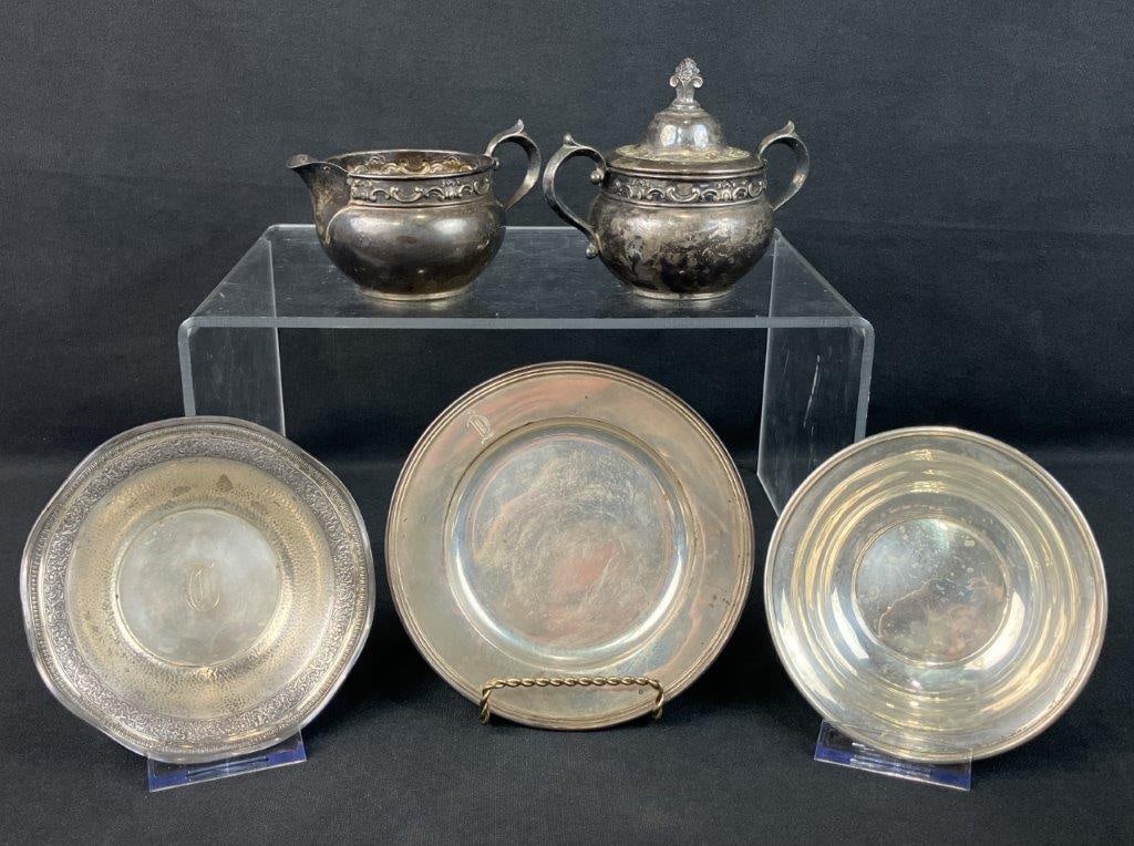 Lot of Sterling Silver Featuring Gorham: Group of sterling silver including a sugar and creamer by Gorham Manufacturing Company with distinctive floral repoussÃ© decoration, together with three additional pieces. Total weight