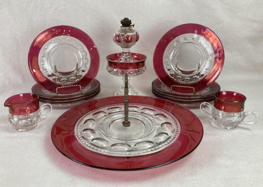 Red King's Crown Dish Lot: This vibrant 13-piece assembly of King's Crown glassware features the iconic ruby-stained thumbprint pattern, a classic design that became a staple of the American mid-century table. The set includes