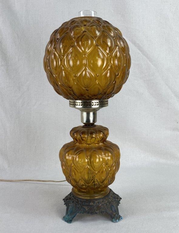 Gone with the Wind Amber Glass Hurricane Lamp: This grand "Gone with the Wind" style hurricane lamp showcases a matching patterned amber glass globe and base, casting a warm, honey-hued glow reminiscent of late 19th-century parlor decor. The