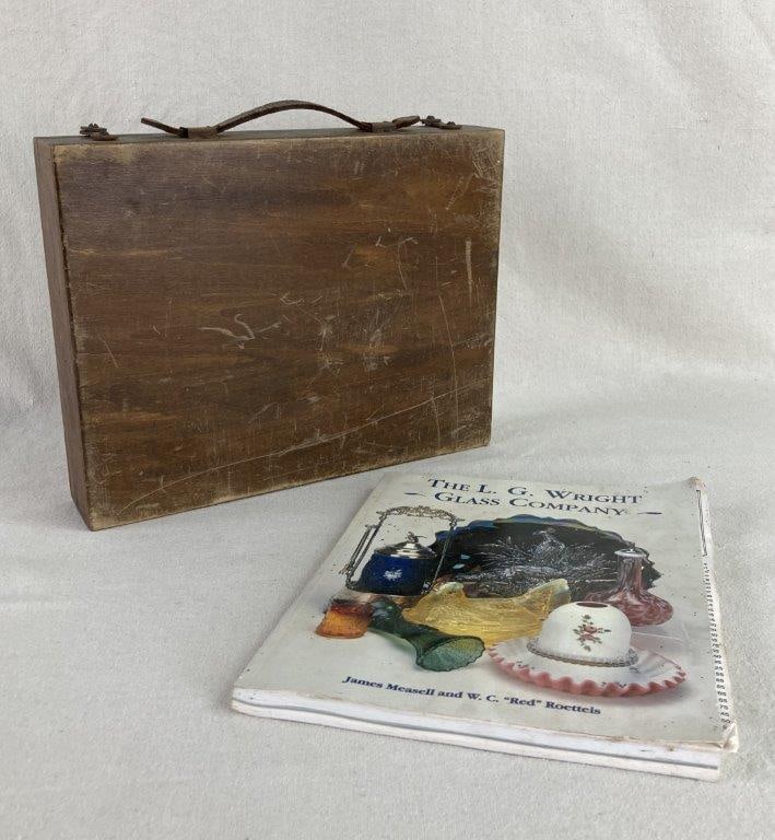 Weber Wood Storage Box and Glass Catalog: This historical pairing features a 19th-century Weber wood storage box, originally crafted by the renowned art supply manufacturer F. Weber & Co., which still contains its original Weber Light Drying